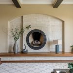 how to style a statement fireplace in your living room